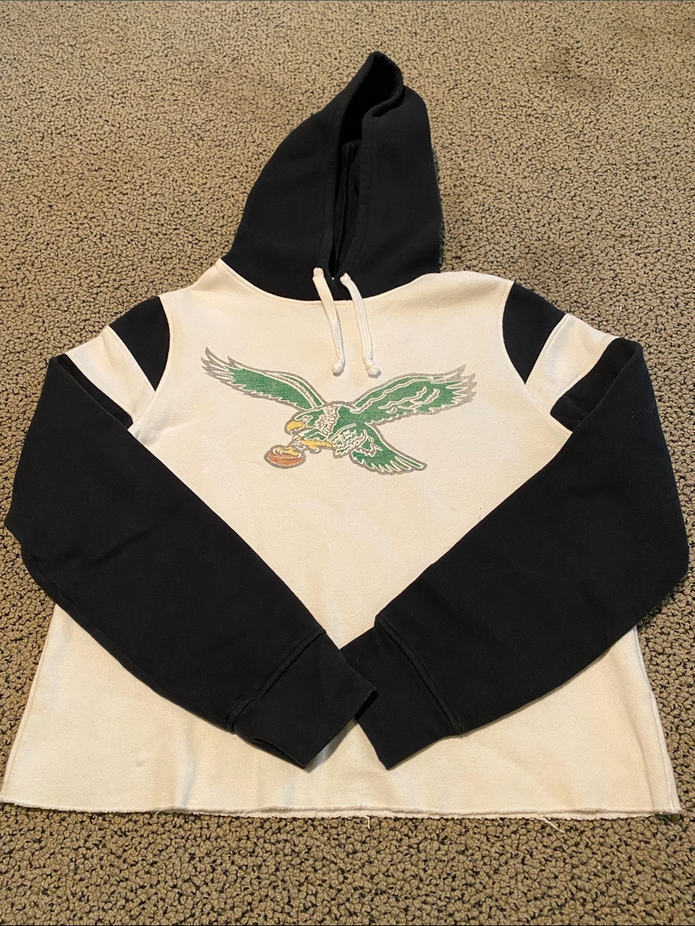 Junk Food Clothing Black & White Hoodie with Green Eagle Graphic